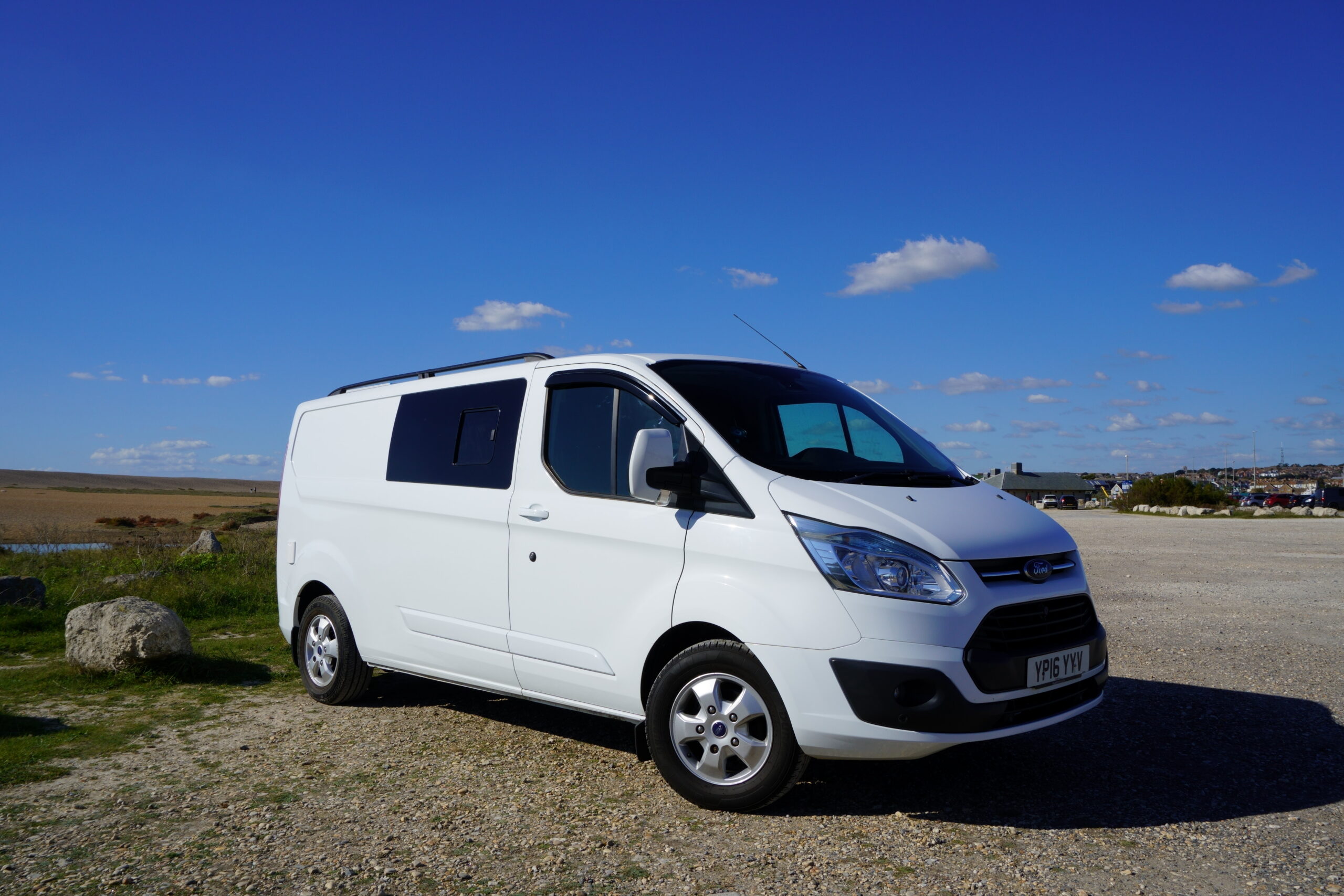 Coastal Weekender white campervan exterior at the coast