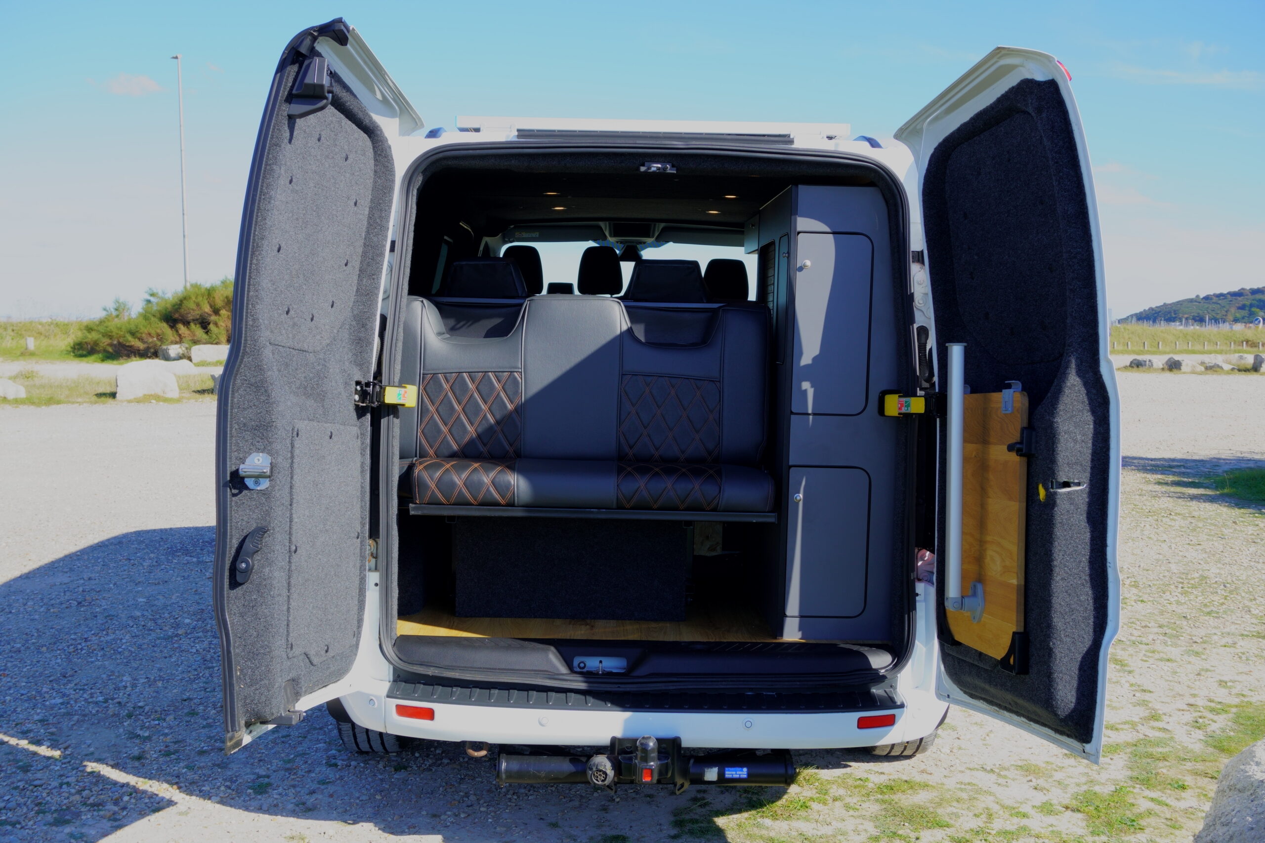 Coastal Weekender open rear doors with converted interior