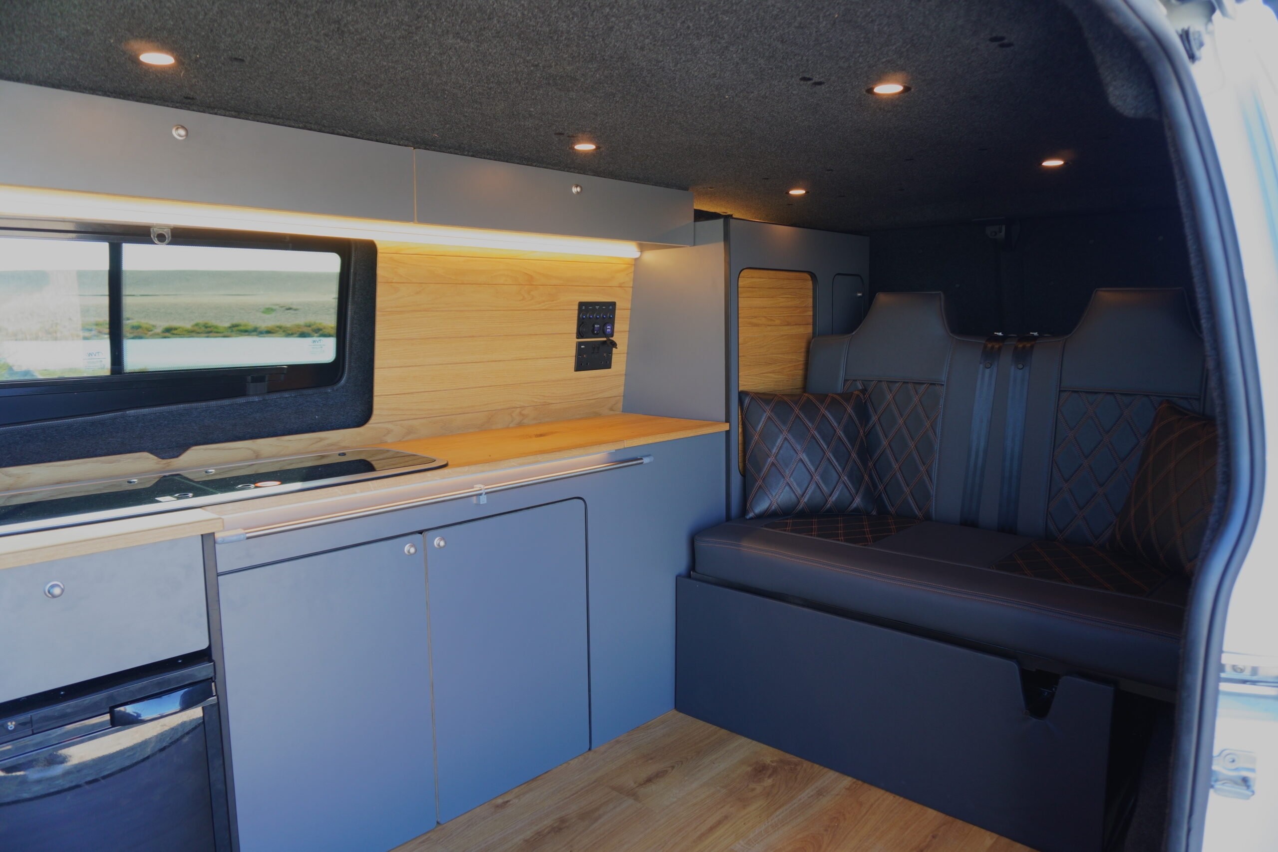 Coastal Weekender interior viewed through open rear doors